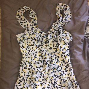 DONATED TOWARDS TORNADO RELIEF Super cute yellow flower dress!